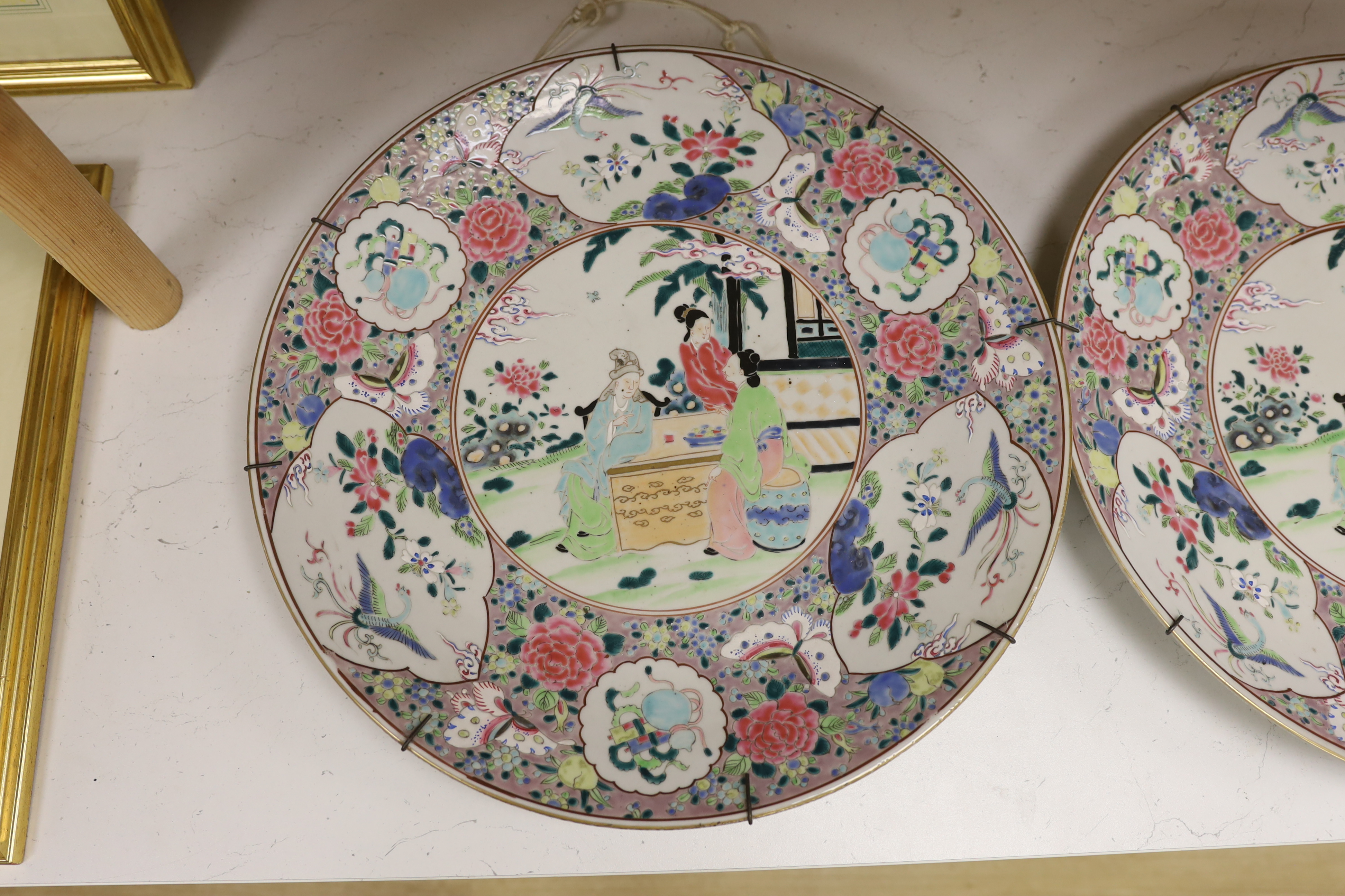 A pair of early 20th century Japanese porcelain chargers, 46cm diameter